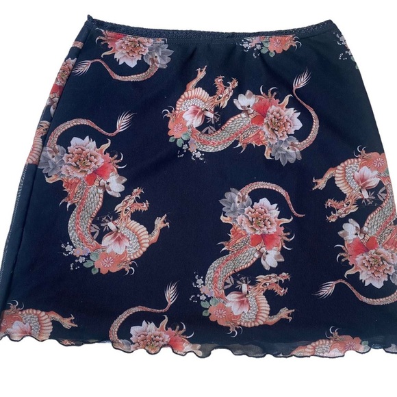Black Mesh Dragon Mini Skirt
Dragon Print
Lace frill
Urban Outfitters Small - Picture 2 of 3